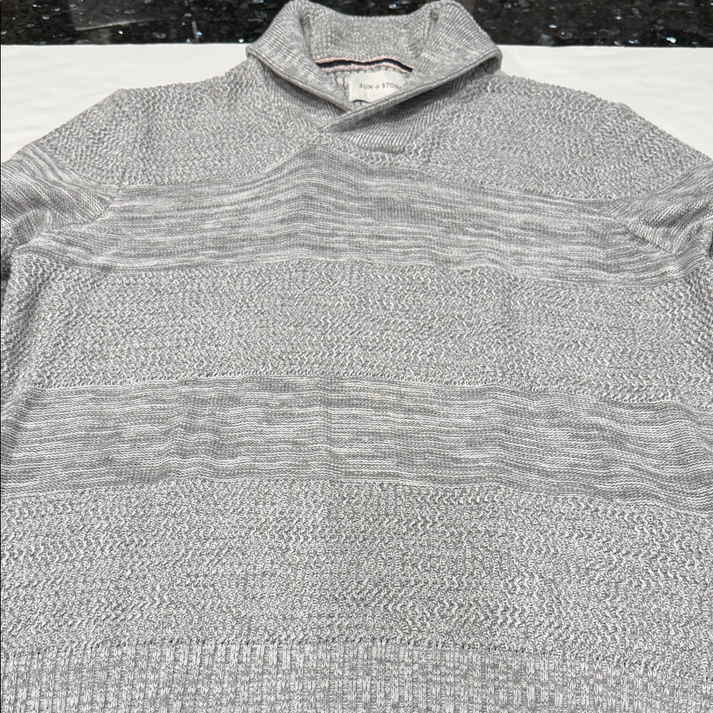 Men’s size XL gray sweater.  In excellent condition.